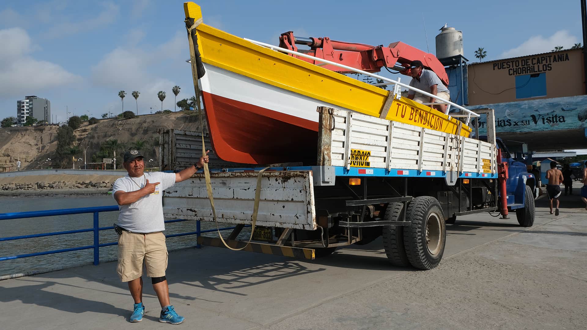 Fisherman proudly showing his brand new boat | Responsible Travel Peru