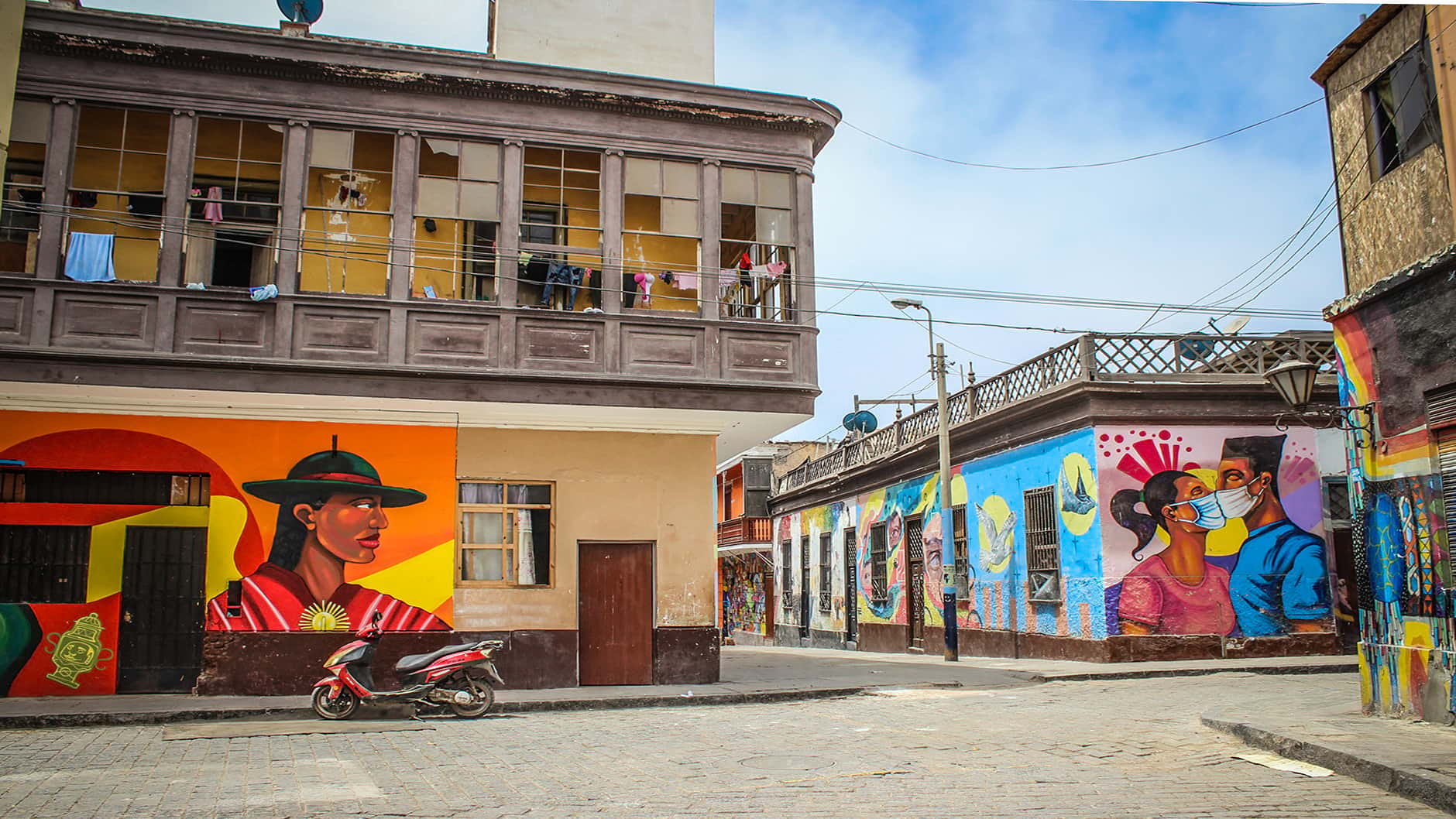 Several street murals can be seen on city buildings in Lima during a tour with Responsible Travel Peru