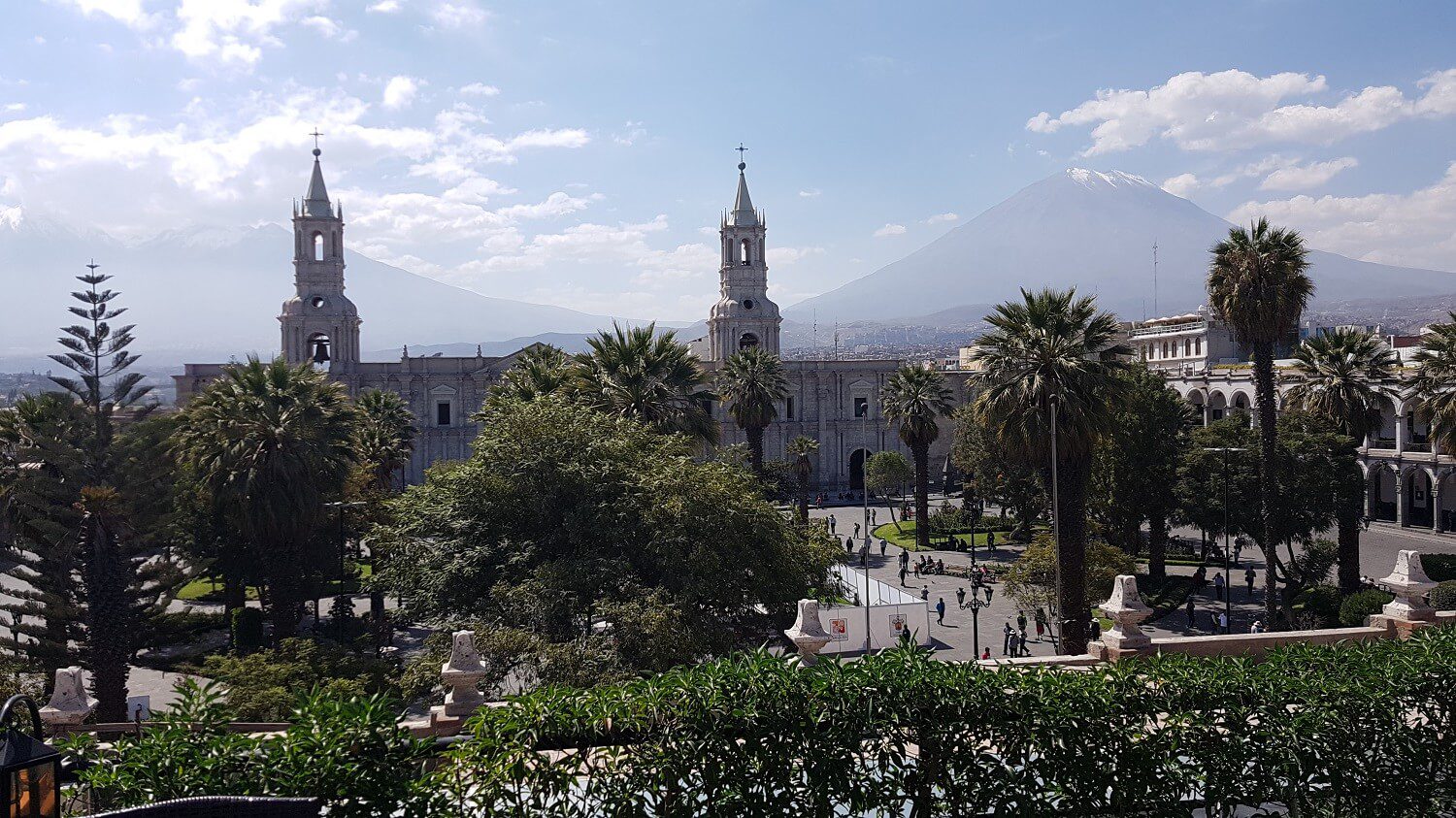 View on the main square of Arequipa from a hotel terrace, with the volcanoes on the background. - RESPONSible Travel Peru