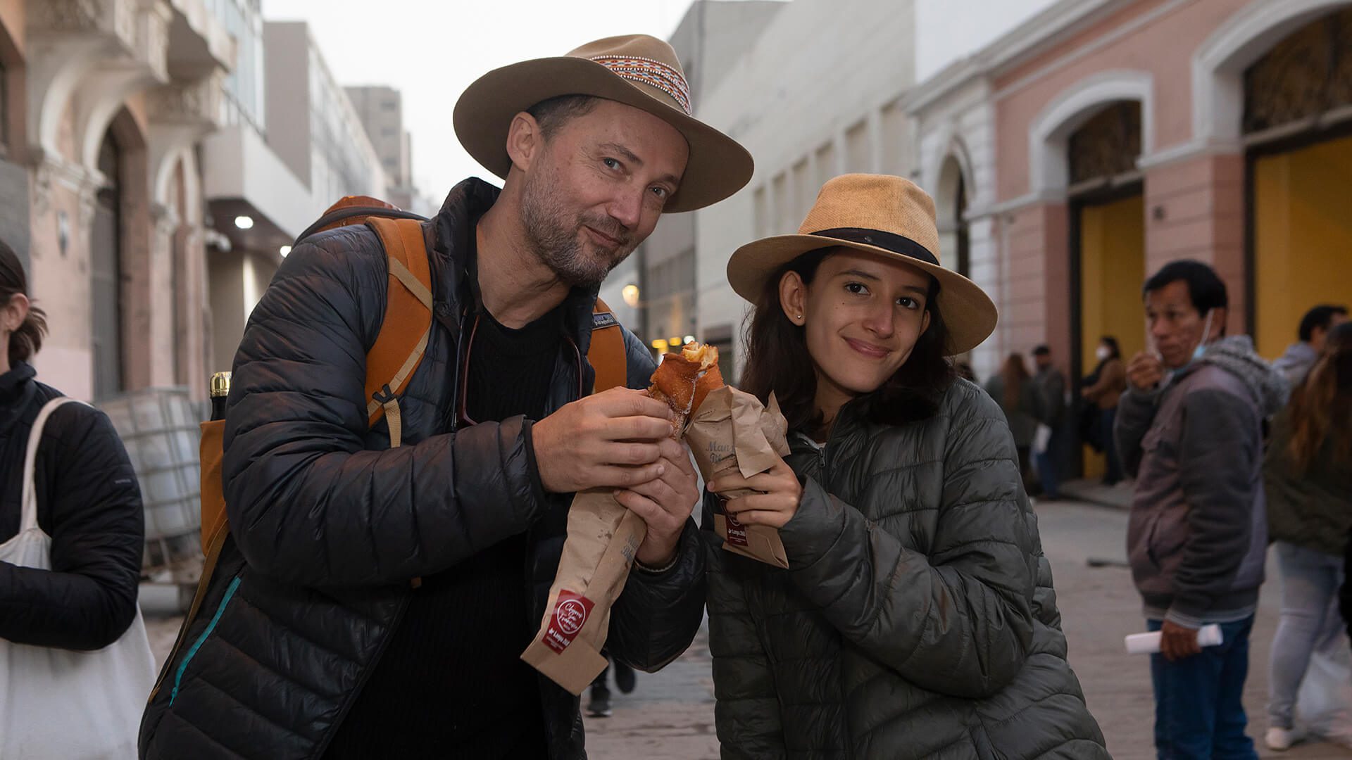 "Father and daughter enjoying a gastronomic experience in Lima | Impactful Travel"