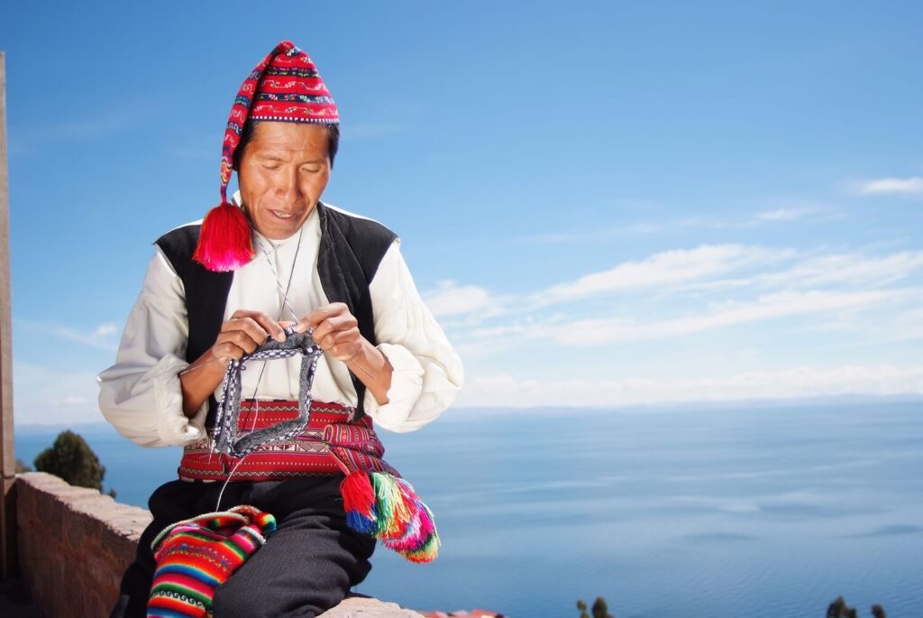 On the island of Taquile, in Lake Titicaca, the men knit and the women weave. Learn everything about Taquile's traditions participating in responsible excursions with RESPONSible Travel Peru.