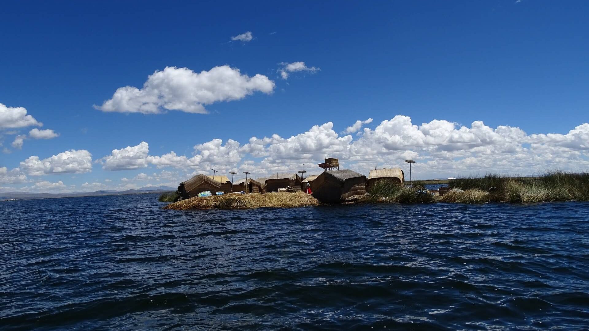 Floating reed island Uros Titino is a hidden gem of Lake Titicaca. Visit it with RESPONSible Travel Peru