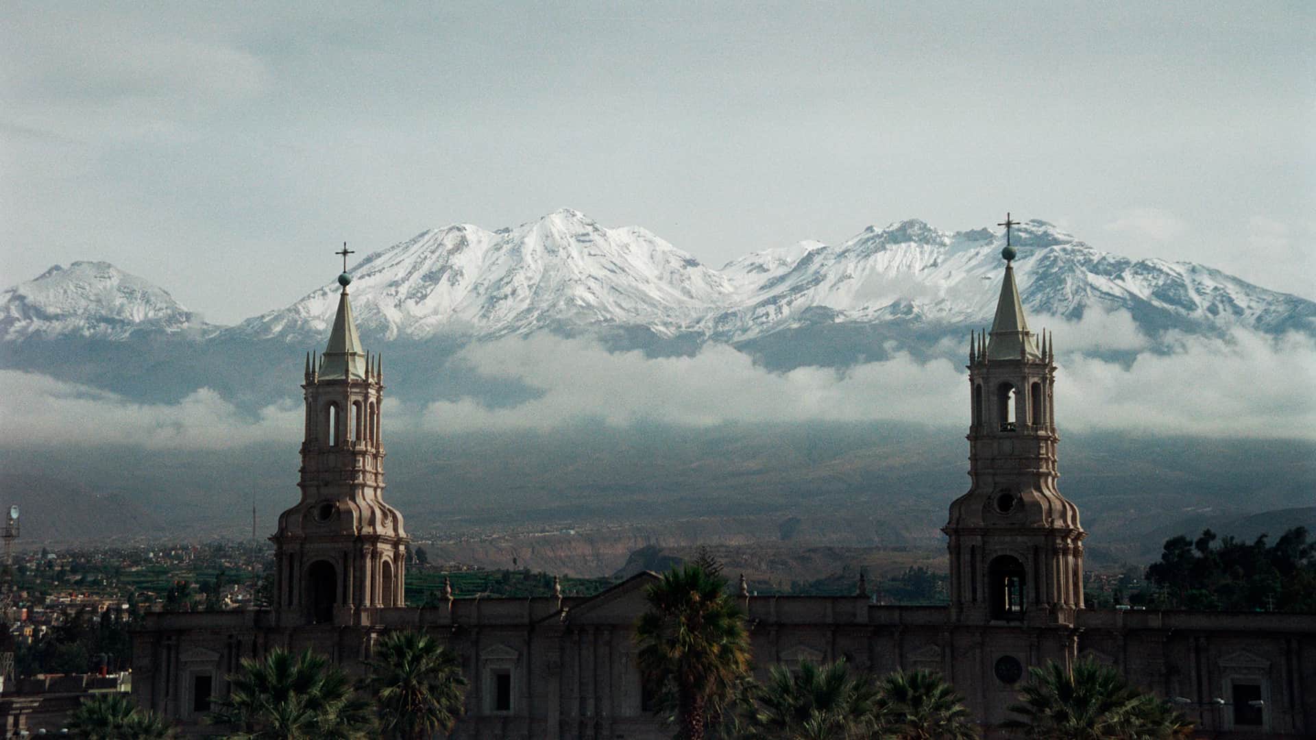 the cathedral of Arequipa with the Chachani volcano in the background | Responsible Travel Peru
