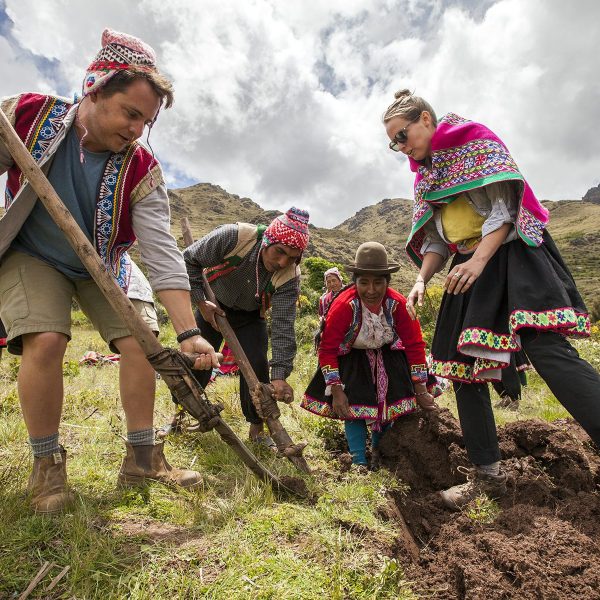 The chaquitaclla, also known as the foot plow, was one of the most important farming tools of the Andean world | Community-Based Tourism in the Sacred Valley with Impactful Travel Peru - Experience a Day of Fellowship with an Andean Community