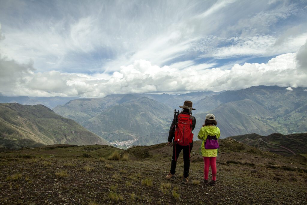 Mom and daughter enjoying the view of the Sacred Valley | Responsible Travel Peru