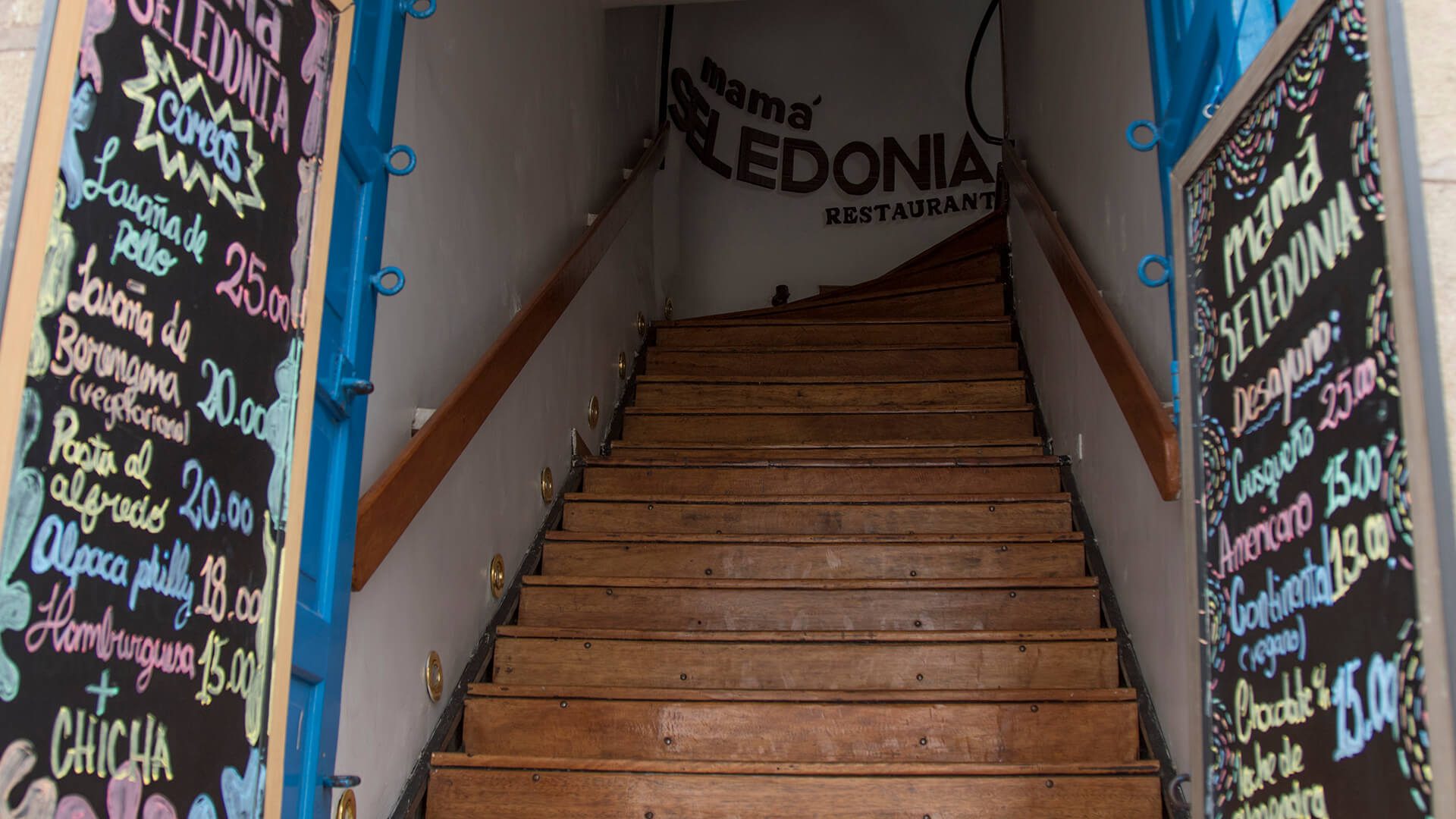 Staircase towards Mamá Seledonia restaurant located on a second floor | RESPONSible Travel Peru