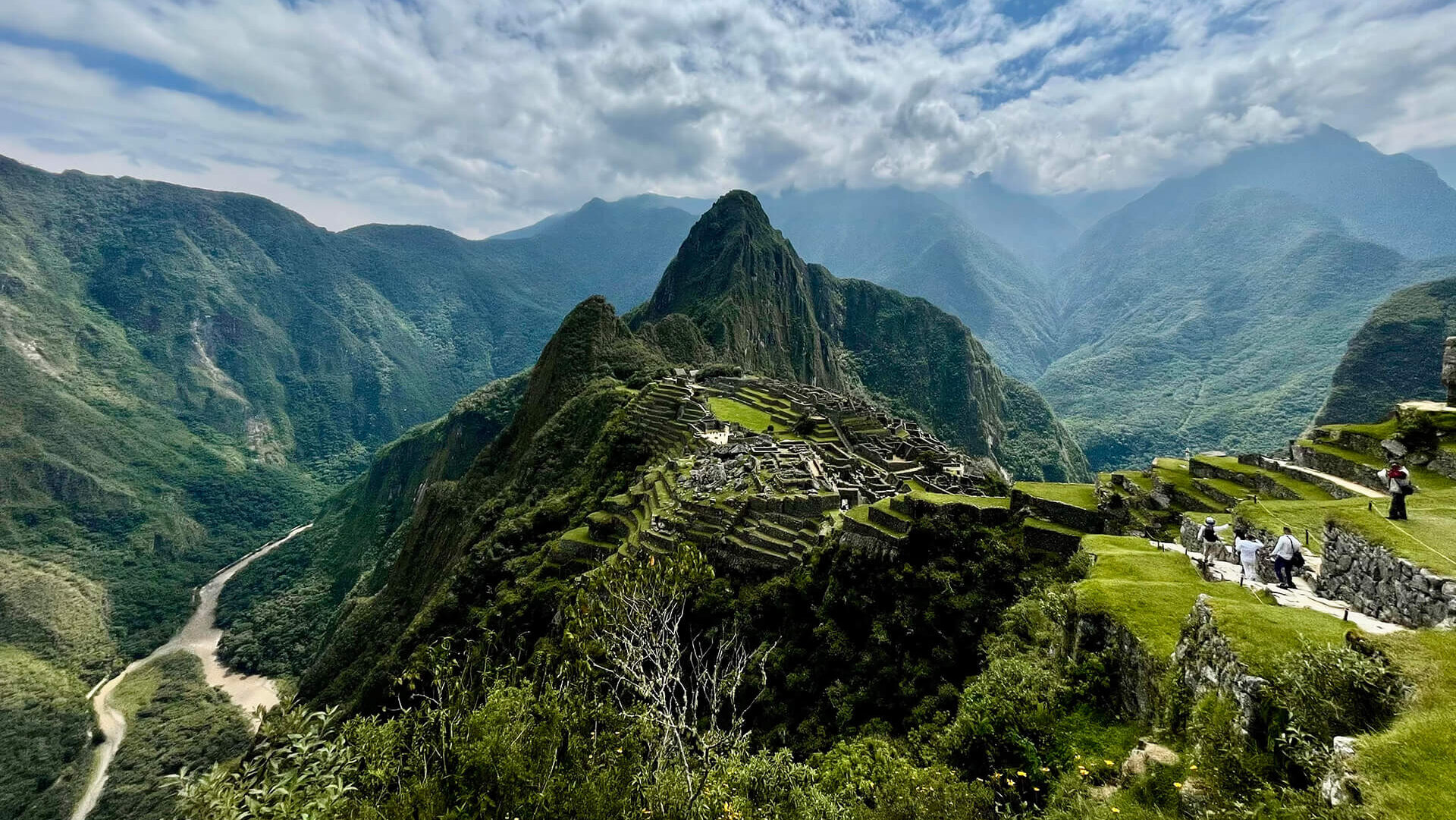 Machu Picchu on a cloudy day and Urubamba river | RESPONSible Travel Peru