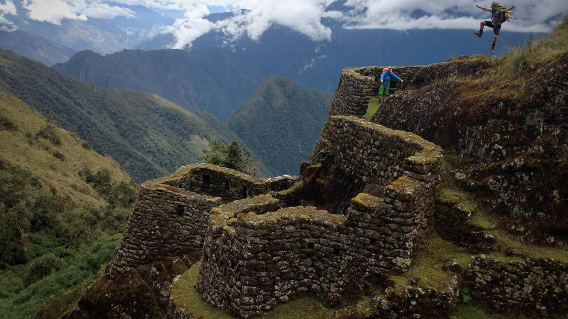 Two guys in Phuyupatamarca ruins along the Inca Trail | RESPONSible Travel Peru