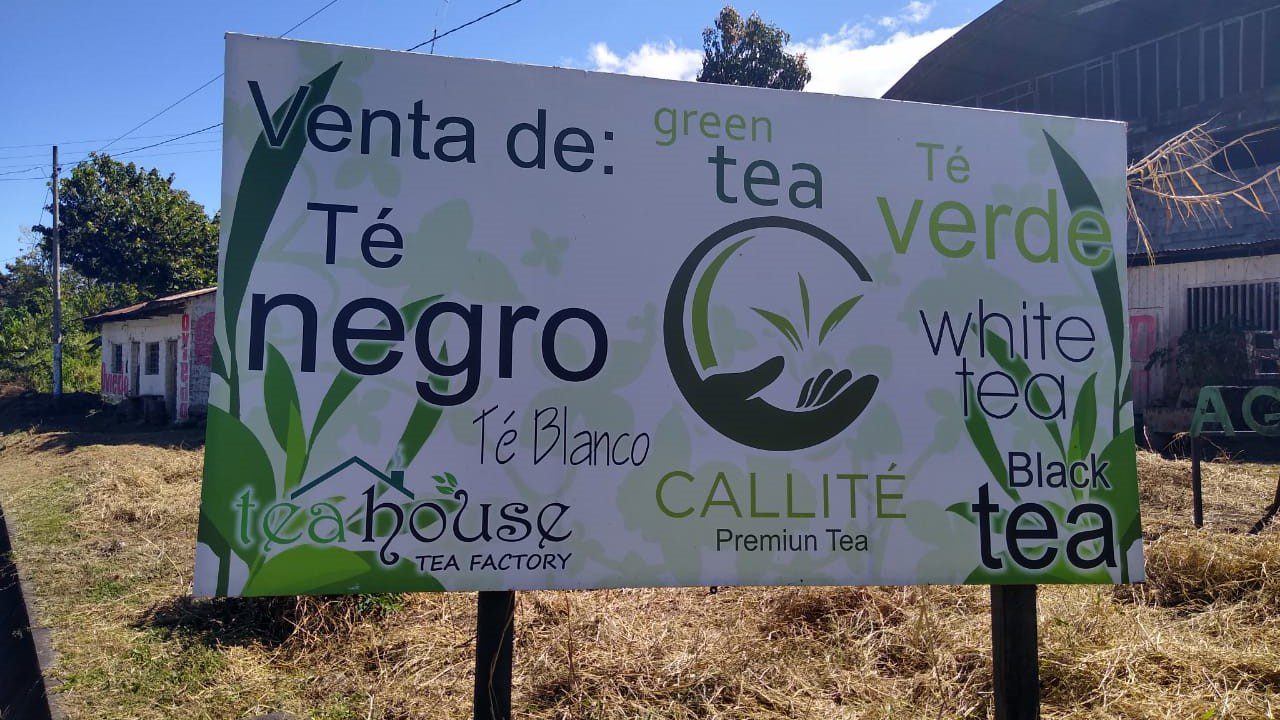 The new sign of the tea factory in front of the old building - RESPONSible Travel Peru