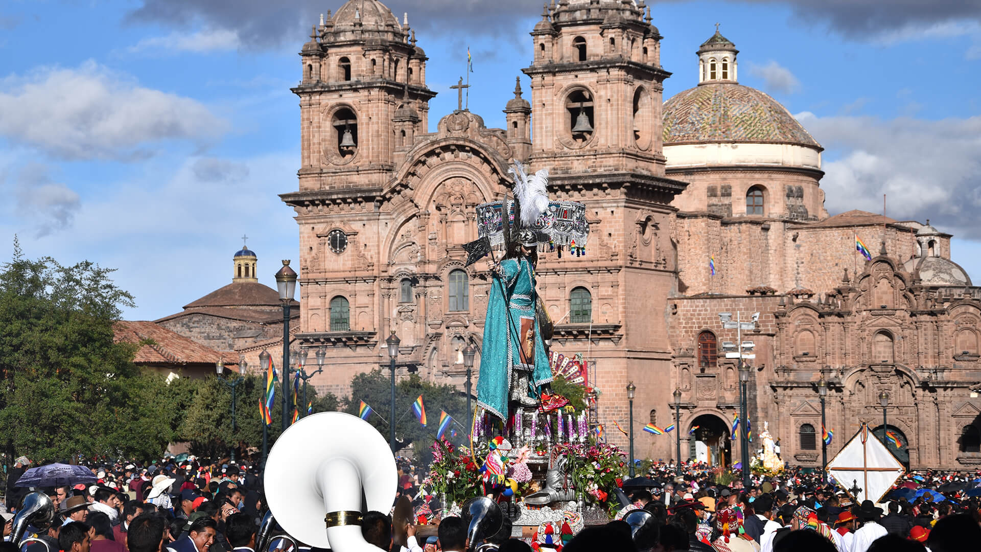A festivity taking place in the Plaza de Armas (Main square) of Cusco with The Church of the Company of Jesus in the back