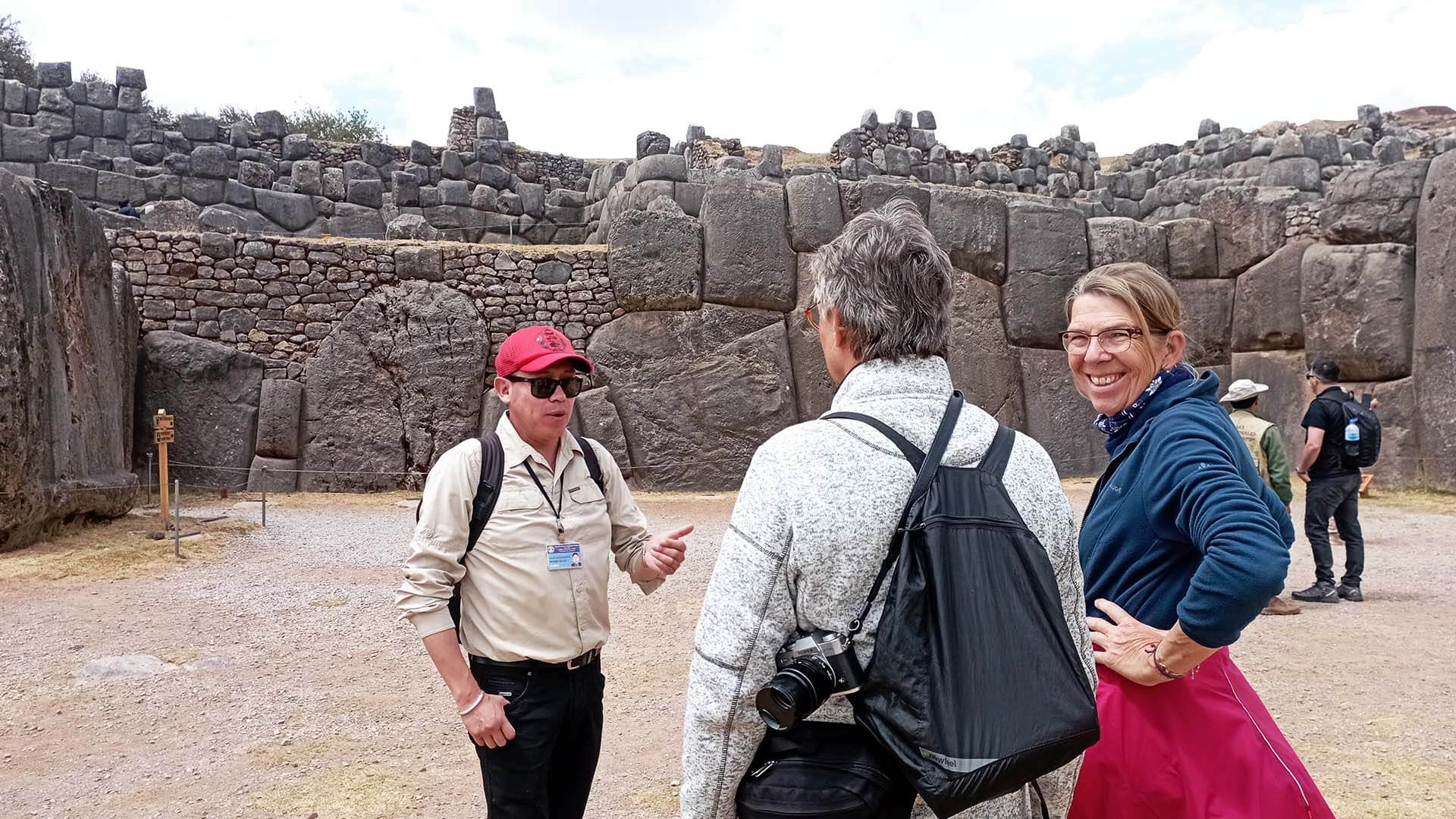 Happy tourists in Sacsayhuaman - RESPONSible Travel Peru