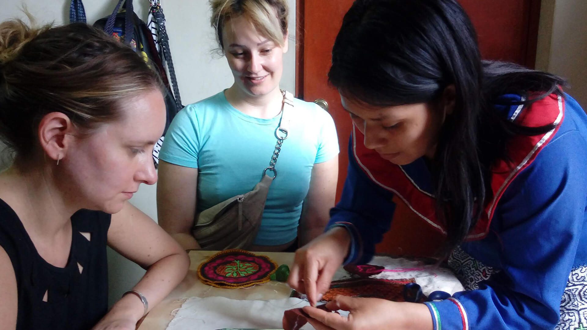 Shipibo-Konibo woman teaching her traditional embroidery techniques
