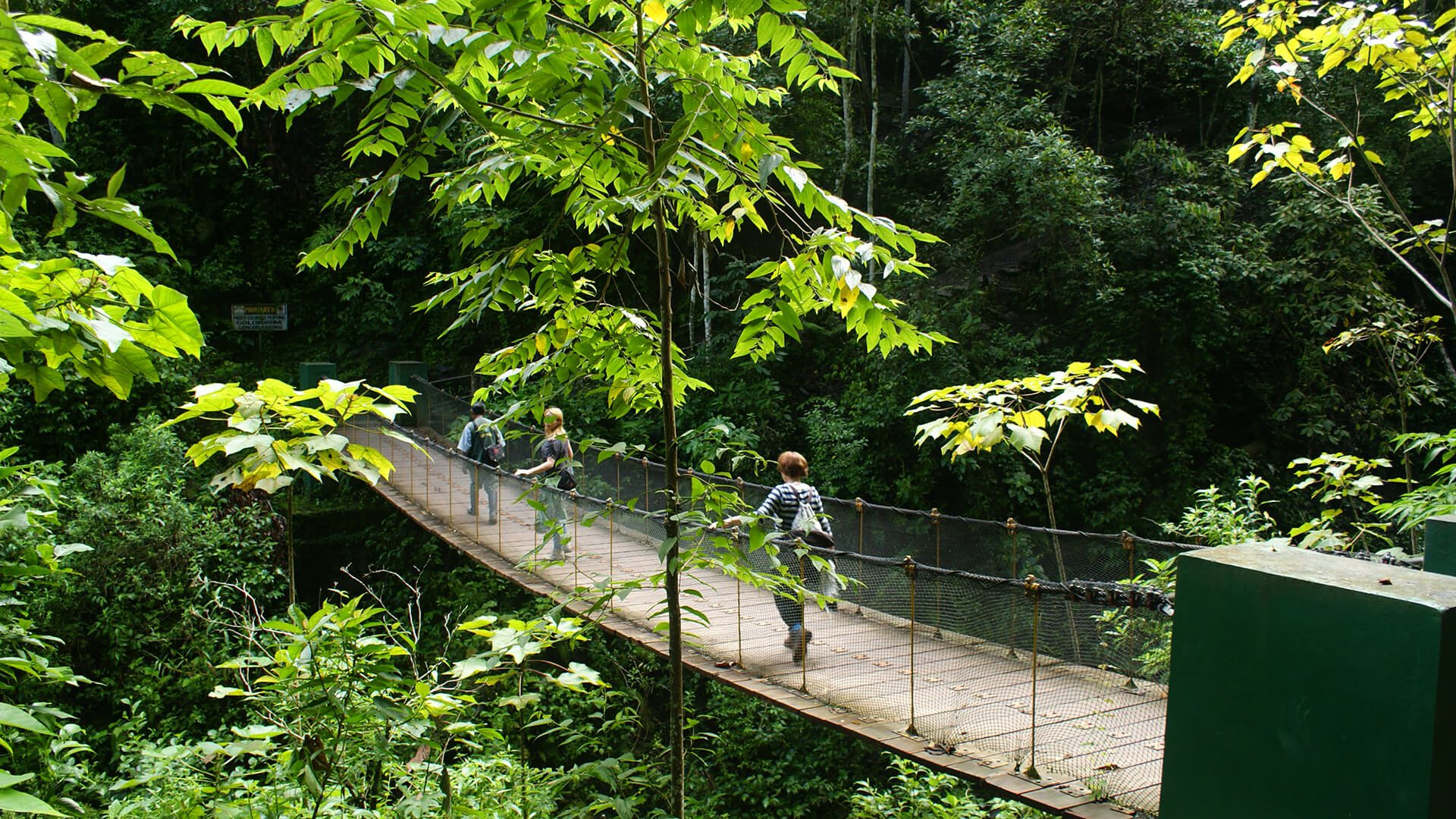 Pedestrian hanging bridge over the river towards the Gocta waterfalls