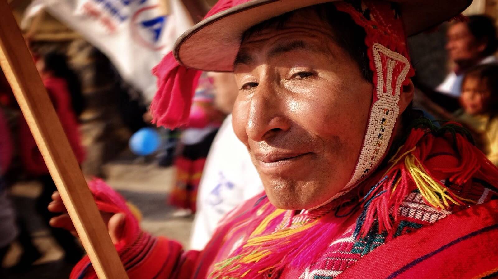 Peruvian man wearing colorful typical clothes in the authentic Andean village of Huacahuasi, lares, Peru | RESPONSible Travel Peru