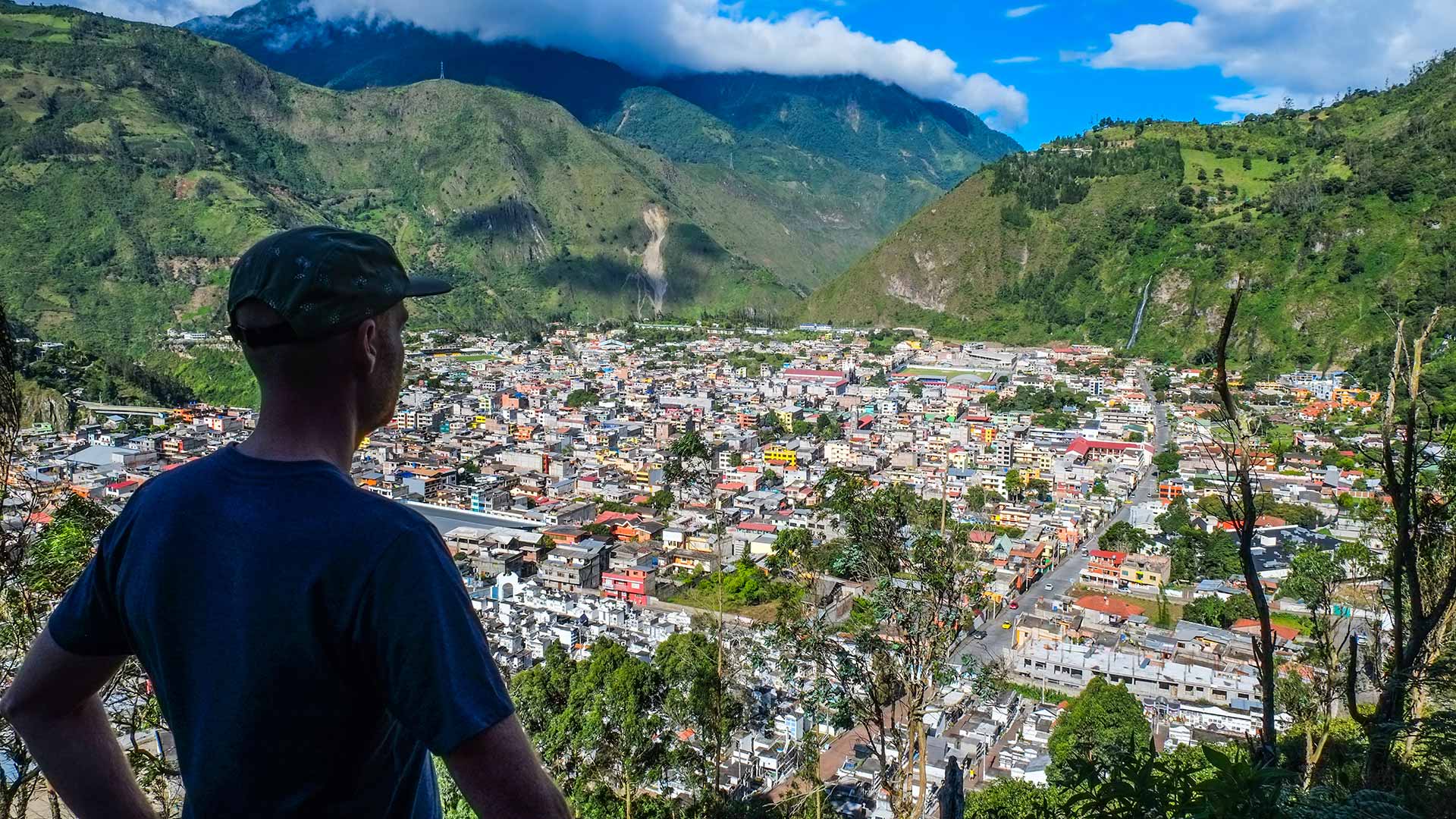 Overlooking the famous city of Baños de Agua Santa, in Ecuador | Impactful Travel