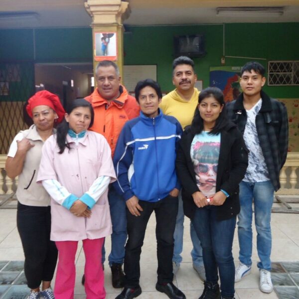 The team of Sin Soluka in Ecuador receives Impactful Travel's tourists during their Quito Walking Tour