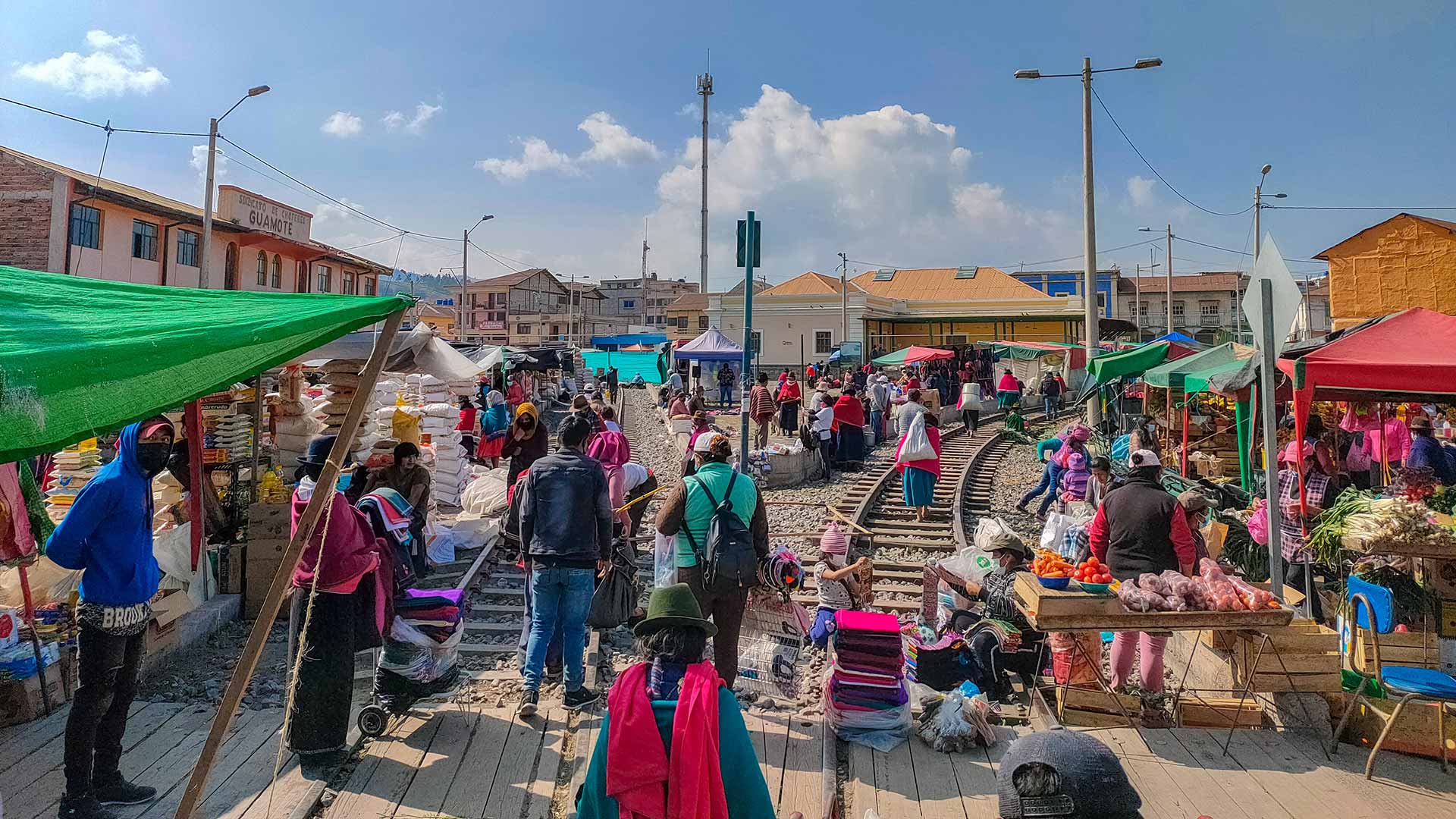 Inhabitants of the authentic and highly indigenous town of Guamote, in Chimborazo, Ecuador, are celebrating a colorful local market on the railway. Impactful Travel