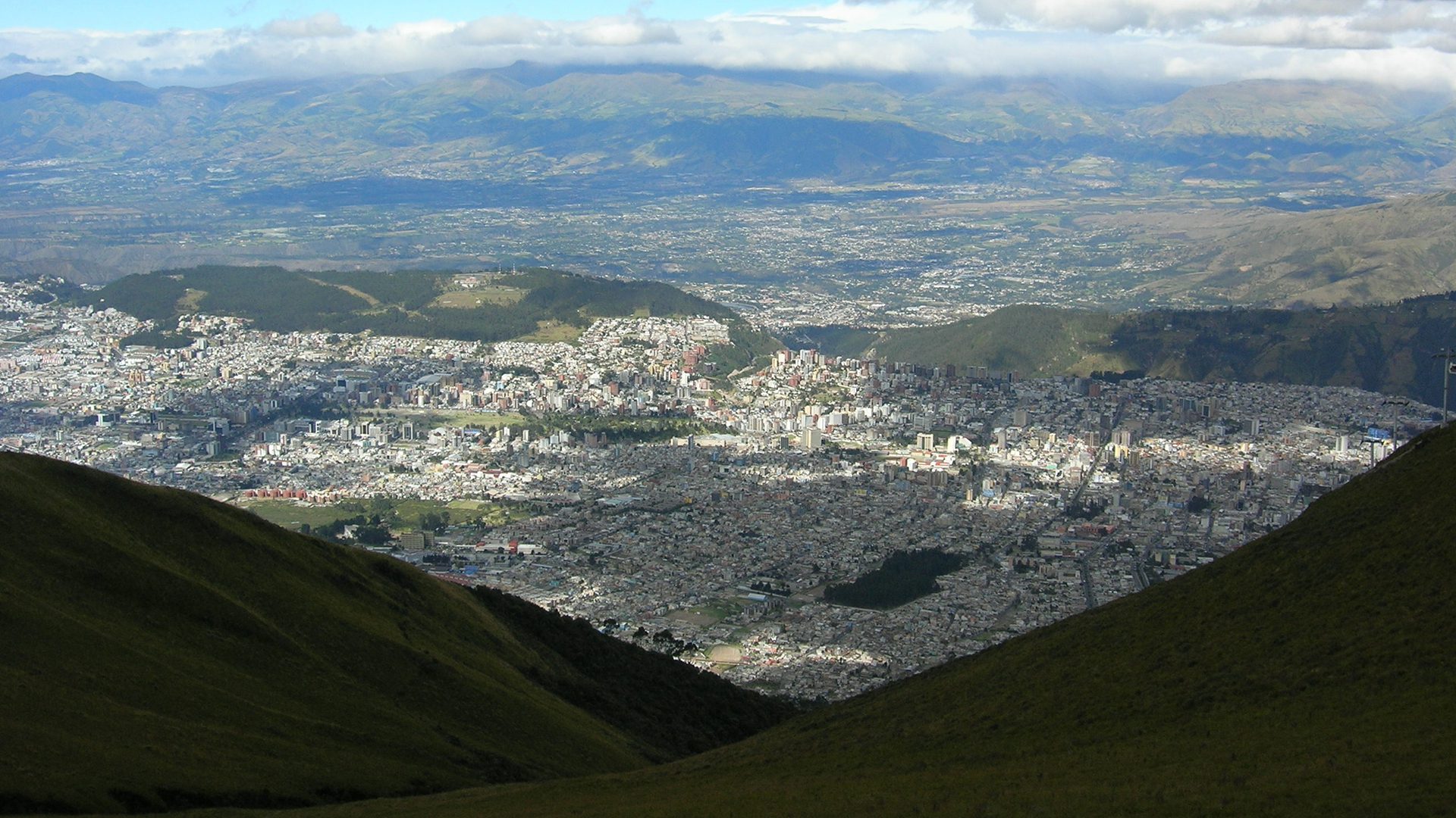 Beautiful Quito, the capital of Ecuador, from a distance. Visit Quito in an alternative way with Impactful Travel's Quito Walking Tour
