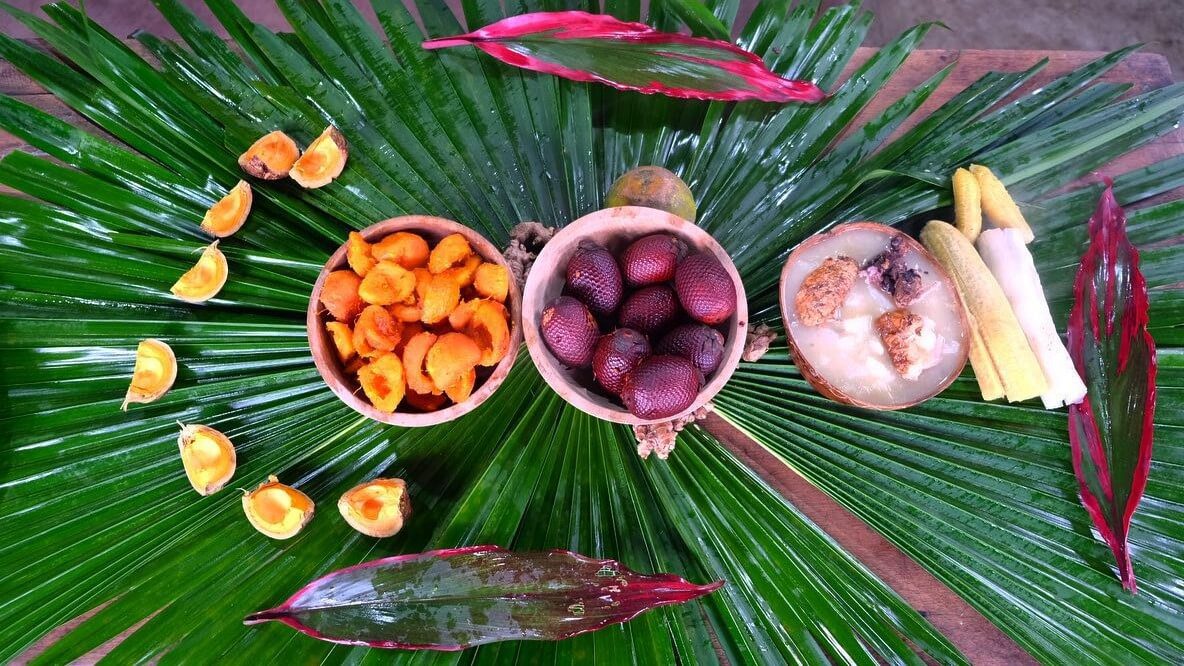 Typical fruits harvested from Amupakin's gardens. Take a Tena Amazon Tour with Impactful Travel to immerse in Ecuador's jungle food and culture.