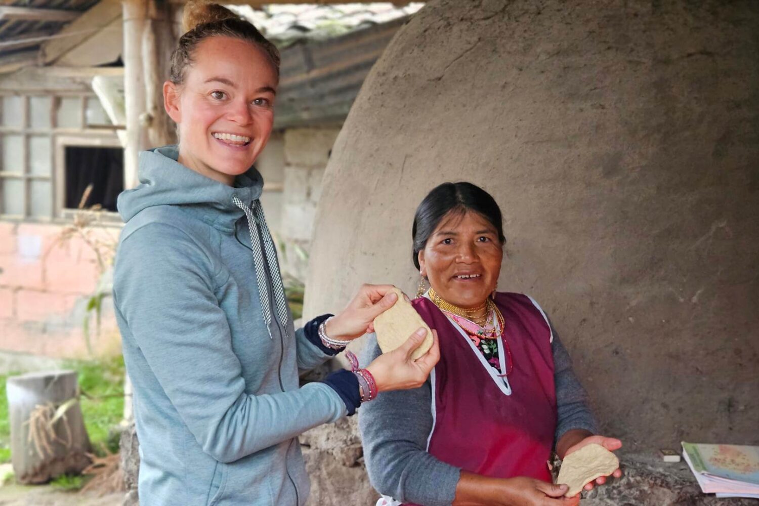 Travelers are invited to making their own tortillas de tiesto for breakfast in the community of San Clemente in northern Ecuador | Impactful Travel